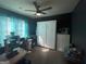 Bedroom with a murphy bed and ceiling fan at 1687 Blue Heron Way, Hampton, GA 30228