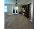 A cozy living room with a door to the exterior at 1687 Blue Heron Way, Hampton, GA 30228