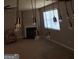 A large living room with a fireplace and contemporary lighting fixtures at 1687 Blue Heron Way, Hampton, GA 30228