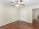 Bedroom with laminated floors, ceiling fan, double doors closet, and neutral paint color at 1235 Labonte Pkwy, Mcdonough, GA 30253
