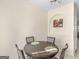 Cozy dining nook with a decorative painting and a view of the living room at 1235 Labonte Pkwy, Mcdonough, GA 30253