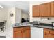 Kitchen with granite countertops, stainless steel sink, and view to the living room at 1235 Labonte Pkwy, Mcdonough, GA 30253