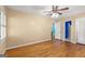 Bedroom with hardwood floors, neutral paint, and a ceiling fan at 437 Forrest Ave, Fayetteville, GA 30214
