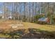View of a large, grassy backyard with covered structure perfect for outdoor gatherings at 437 Forrest Avenue Ave, Fayetteville, GA 30214