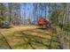 Spacious backyard featuring a shaded seating area at 437 Forrest Avenue Ave, Fayetteville, GA 30214