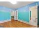 Bedroom featuring hardwood floors and a view into the bathroom at 437 Forrest Avenue Ave, Fayetteville, GA 30214