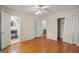 Bedroom featuring hardwood floors and two doors leading to the bathroom at 437 Forrest Avenue Ave, Fayetteville, GA 30214