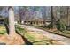 A charming home with a long driveway and mature trees at 437 Forrest Avenue Ave, Fayetteville, GA 30214