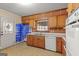 Functional kitchen with classic wooden cabinets and countertops, providing a practical cooking space at 437 Forrest Avenue Ave, Fayetteville, GA 30214
