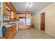 Functional kitchen with classic wooden cabinets and countertops, providing a practical cooking space at 437 Forrest Avenue Ave, Fayetteville, GA 30214