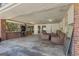 Spacious covered patio with concrete floor, offering ample space for relaxing and entertaining outdoors at 437 Forrest Avenue Ave, Fayetteville, GA 30214
