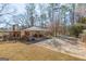 Large covered area with an expansive concrete pad, offering ample space for parking and outdoor enjoyment at 437 Forrest Avenue Ave, Fayetteville, GA 30214