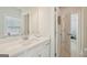 Bathroom with a vanity with a white countertop, and views into other rooms of the house at 401 Hallman Pl, Peachtree City, GA 30269