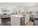 Open concept kitchen with eat-in area and view of the living room at 401 Hallman Pl, Peachtree City, GA 30269