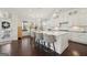 Beautiful kitchen with an island, white cabinets, and pendant lighting at 401 Hallman Pl, Peachtree City, GA 30269