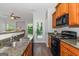 Modern kitchen featuring granite countertops, stainless steel appliances, and hardwood floors at 473 Tufton Se Trl, Atlanta, GA 30354