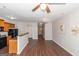 Inviting living room featuring ceiling fan, hardwood floors, and an open layout at 473 Tufton Se Trl, Atlanta, GA 30354