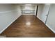 Finished basement with hardwood floors and built in shelving at 2930 David Ne Ln, Conyers, GA 30012