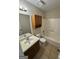 Full bathroom featuring a vanity, toilet, and tub-shower combination at 2930 David Ne Ln, Conyers, GA 30012