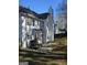 Backyard featuring a patio area perfect for outdoor dining and a fenced perimeter for privacy at 5725 Lake Windsor Pkwy, Buford, GA 30518