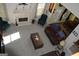 Living room featuring a fireplace, comfortable seating, and natural light from the windows at 5725 Lake Windsor Pkwy, Buford, GA 30518
