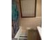 Bathroom with a tub and shower curtain next to the vanity at 392 Hwy 314, Fayetteville, GA 30214