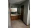 Bathroom featuring a sink with wood cabinets and a mirror at 392 Hwy 314, Fayetteville, GA 30214