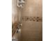 Shower featuring tile surround and clear handled knobs at 392 Hwy 314, Fayetteville, GA 30214