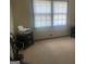 Bright bedroom featuring neutral carpet, and natural light at 392 N Hwy 314, Fayetteville, GA 30214