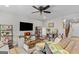 Comfortable living room with modern furniture, decor and natural lighting at 62 Cobblestone Crk, Peachtree City, GA 30269
