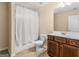 Bathroom featuring a vanity with a sink and a shower with a white shower curtain at 109 Faversham Dr, Mcdonough, GA 30252