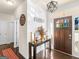 Inviting foyer featuring wood floors and stylish decor that complements the interior design at 109 Faversham Dr, Mcdonough, GA 30252