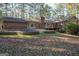 Expansive backyard features a charming deck and lush greenery at 250 Devilla Trce, Fayetteville, GA 30214