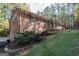 Rambling brick ranch house situated on a lush, gently sloping lot at 250 Devilla Trce, Fayetteville, GA 30214