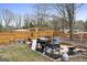 Backyard featuring fenced yard, grill, and various seating areas at 2827 Somerton Dr, Morrow, GA 30260