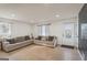 Well-lit living room features laminate floors, recessed lights, and a cozy atmosphere at 2827 Somerton Dr, Morrow, GA 30260