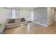 Bright and airy living room featuring laminate floors, natural light, and an open layout at 2827 Somerton Dr, Morrow, GA 30260
