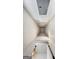 View looking up to the attic access point with decorative light fixture at 9135 Selborne Ln, Chattahoochee Hills, GA 30268