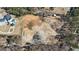 The house is nestled in a large lot next to a luxury home with a swimming pool at 3630 Jim Moore Rd, Dacula, GA 30019