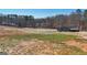 Aerial view of home situated on a sprawling lot, blending grassy areas and open fields at 3630 Jim Moore Rd, Dacula, GA 30019
