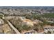 A grand-scale aerial view of the neighborhood shows a mix of development, forestry and nearby roads at 3630 Jim Moore Rd, Dacula, GA 30019
