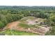 Wooded acreage showcasing the vast lot, including the tree line and potential for development at 3630 Jim Moore Rd, Dacula, GA 30019