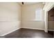 Bedroom with window and neutral walls at 3630 Jim Moore Rd, Dacula, GA 30019