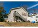 Two-story house featuring siding, traditional windows, and a side staircase at 5365 Renault St, Cumming, GA 30041