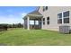 This expansive backyard with patio offers plenty of outdoor space for a variety of activities at 588 Parnassus Road, Locust Grove, GA 30248