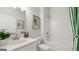 Sparkling bathroom with white fixtures, shower and tub combination at 588 Parnassus Road, Locust Grove, GA 30248
