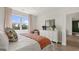 Relaxing bedroom with soft tones, natural light, and stylish furnishings for a comfortable retreat at 588 Parnassus Road, Locust Grove, GA 30248