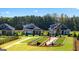 View of the community bocce ball court and dog park in a well-manicured setting at 600 Parnassus Rd, Locust Grove, GA 30248