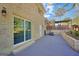 The home's exterior features brick, a concrete patio, a large backyard, and a covered deck at 2594 Cavalier Dr, Decatur, GA 30034