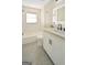 Bathroom featuring modern fixtures, vanity with modern mirror, and white tile at 2594 Cavalier Dr, Decatur, GA 30034